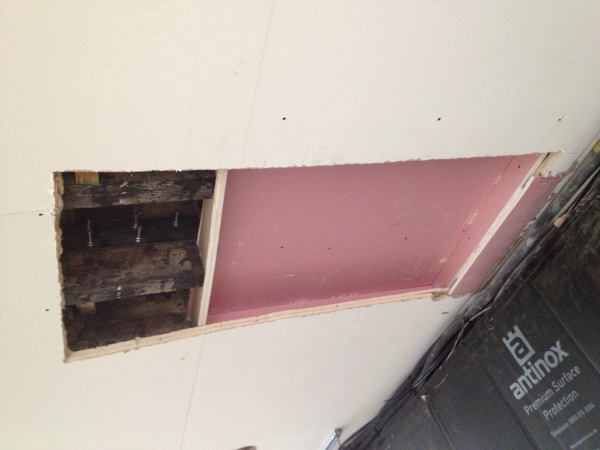 Picture showing the cut out ceiling joists to allow & make room for the Mitsubishi BC box.